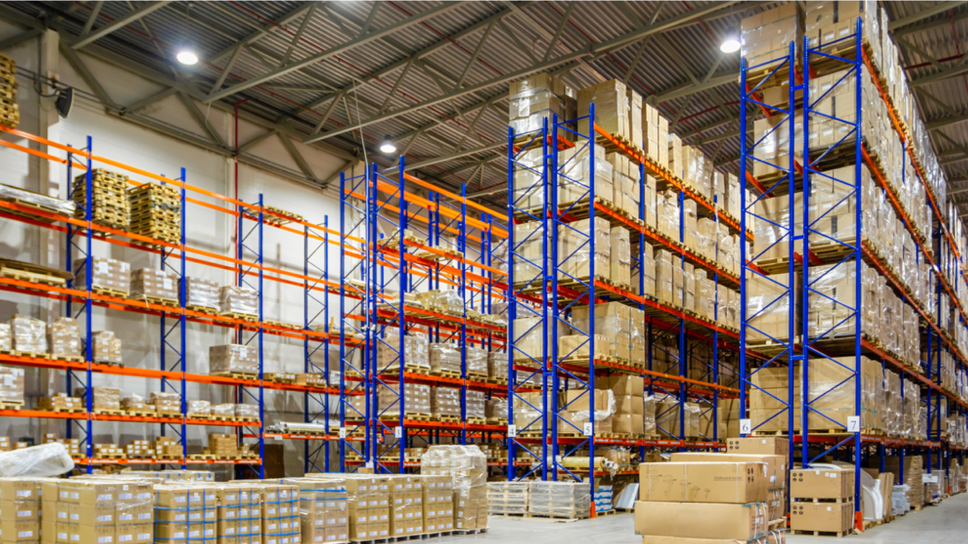 Retail warehouse logistics banner showing inventory storage in a godown